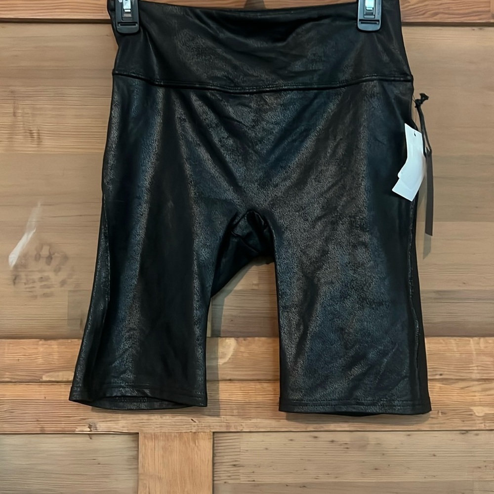 - Black tape , small bike shorts